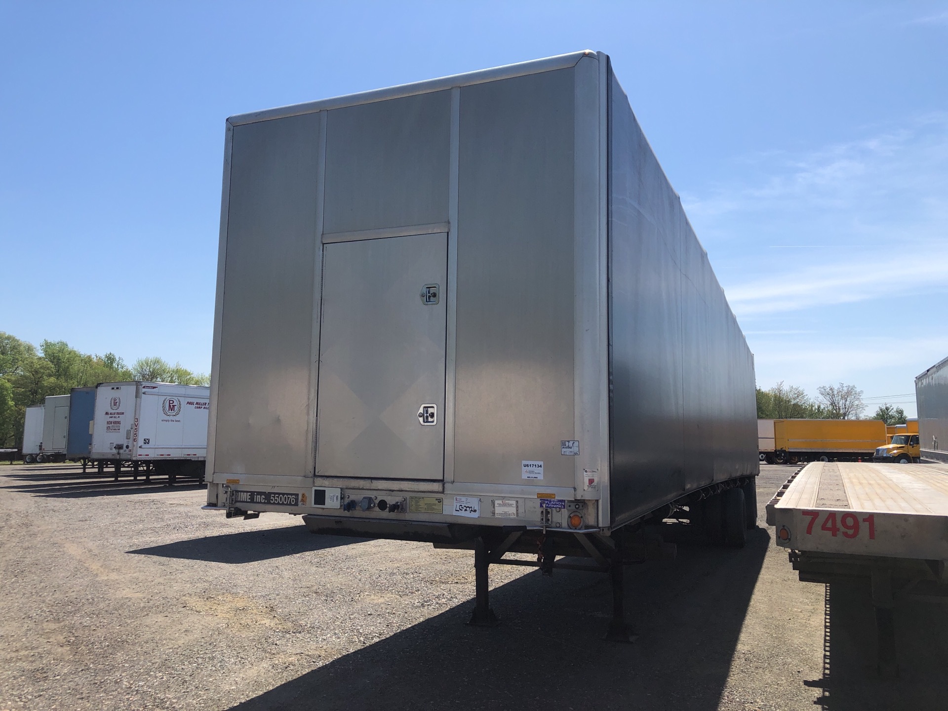 2015 Reitnouer 48 ft T/A Spread Axle Covered Flatbed Trailer